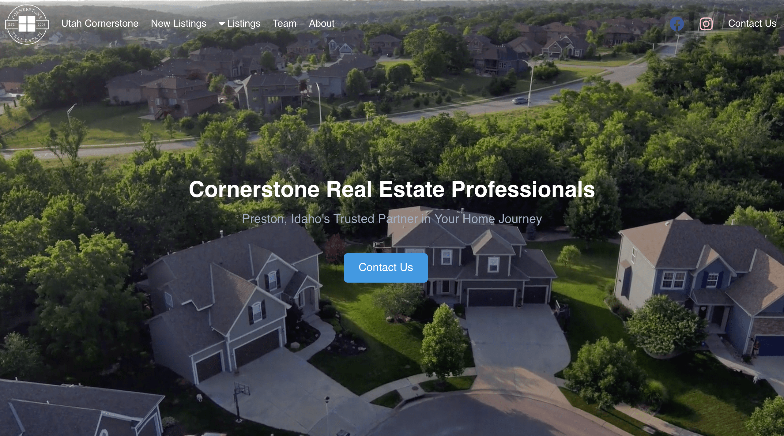 Cornerstone Real Estate homepage with an aerial photo of a neighborhood